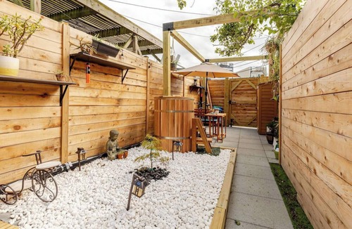 H Street Corridor House | Cozy 2-bedroom Townhome in Washington D.C with Sauna, Cold Plunge + Workout area