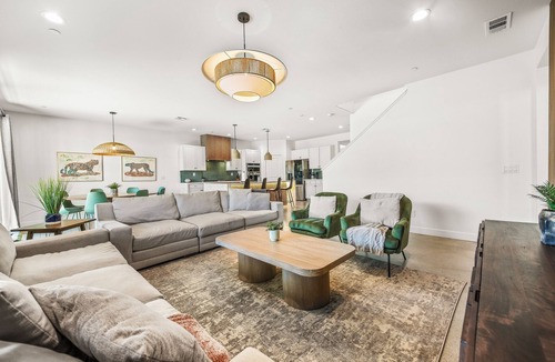 Coachella House | Escape to this newly remodeled 7-bedroom desert retreat designed for relaxation and fun. Enjoy a large resort-style pool and spa, a fully stocked kitchen, spacious game room, and outdoor games perfect for group play under endless blue skies. Whether
