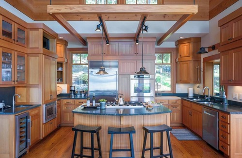 Orcas House | Magnificent waterfront home where sustainability meets luxury. Five private wooded acres, 400ft of rocky bluff shoreline, Chef's Kitchen, Stone Fireplaces, Heated Tile Floors & Unforgettable Sunsets over Wasp Passage. Your perfect PNW escape awaits.