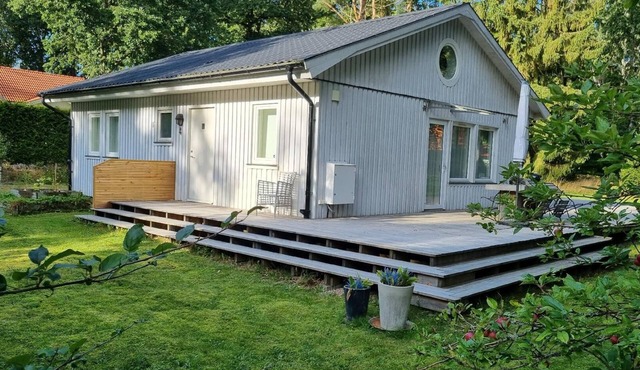 Holiday home with terrace, grill, and garden
