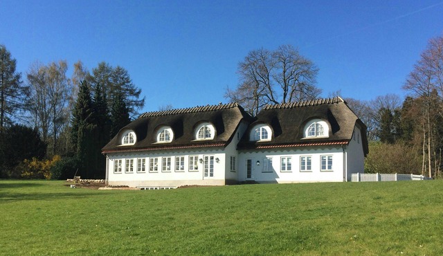 Thatched landmark in the forest by Valdemar Castle in Svendborg