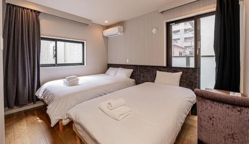 Four-Bedroom Apartment with Balcony 