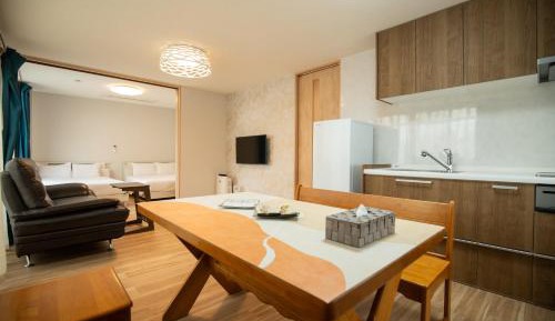 Four-Bedroom Apartment with Balcony 