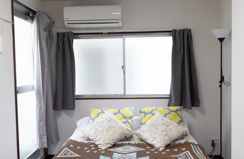 Nishi-Shinjuku Apartment | 5 min. walk from Nishi-Shinjuku 5-chome Station & Table bed & 20 sq.m. with veranda
