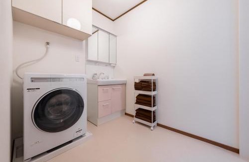 Fukushima Villa | ステイワン SOsaka 大阪駅まで1分 寝室4部屋ベッド7台 最大11名利用