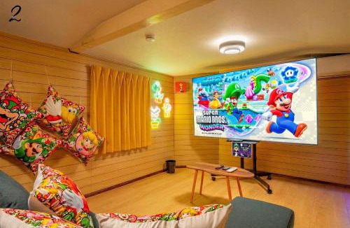 Shin-Osaka Apartment | 7BR Entire 2-House Rental Sleeps 12 Theater and Games Umeda 3 Min