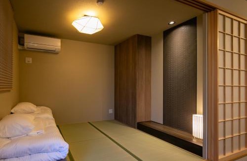Nakamura Apartment | trive meieki taikodori1 8名から12名宿泊可能 1台無料駐車場付き 新築戸建て貸し切り